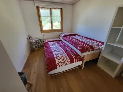 Ein Bett oder Betten in einem Zimmer der Unterkunft Uf em Schloss