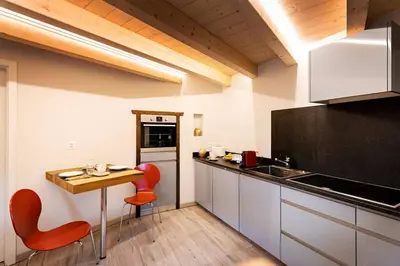 Küche/Küchenzeile in der Unterkunft Modernes Loft an Top-Lage by ZermattStays