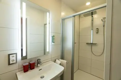 Ein Badezimmer in der Unterkunft Modernes Loft an Top-Lage by ZermattStays