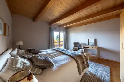 Ein Bett oder Betten in einem Zimmer der Unterkunft Chalet Occursus Anzère