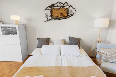 Ein Bett oder Betten in einem Zimmer der Unterkunft Crans-Montana - studio - 2 personnes - balcon avec superbe vue
