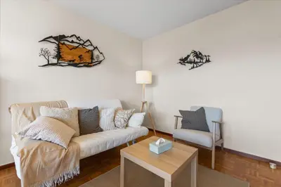 Ein Sitzbereich in der Unterkunft Crans-Montana - studio - 2 personnes - balcon avec superbe vue