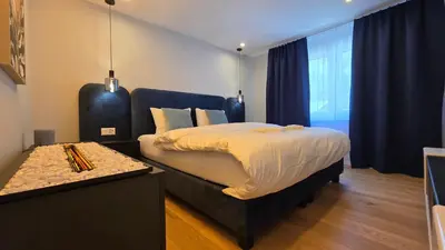 Ein Bett oder Betten in einem Zimmer der Unterkunft Zermo Eden
