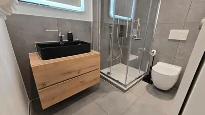 Ein Badezimmer in der Unterkunft Zermo Eden