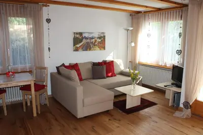 Ein Sitzbereich in der Unterkunft Chalet Gerbera 1
