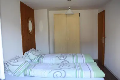 Ein Bett oder Betten in einem Zimmer der Unterkunft Chalet Gerbera 2