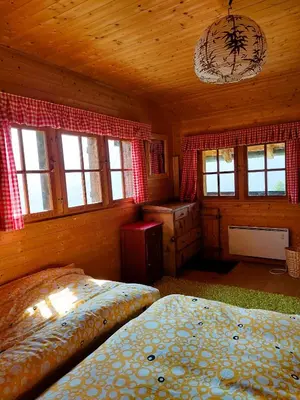 Ein Bett oder Betten in einem Zimmer der Unterkunft Mayen Farquesses Mayen de Montagne 4 personnes