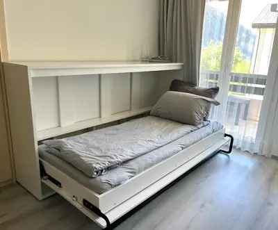 Ein Bett oder Betten in einem Zimmer der Unterkunft Family friendly duplex with free parking