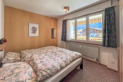 Ein Bett oder Betten in einem Zimmer der Unterkunft Classic Swiss Mountain Panorama