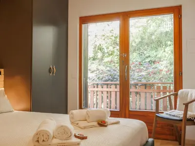 Ein Bett oder Betten in einem Zimmer der Unterkunft Apartment Hortensia 10 by Interhome