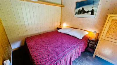 Ein Bett oder Betten in einem Zimmer der Unterkunft Chalet l Houtot