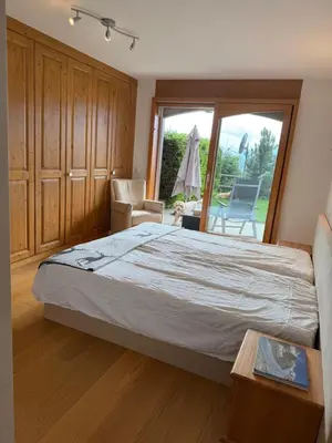 Ein Bett oder Betten in einem Zimmer der Unterkunft Crans-Montana Chalet