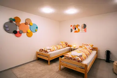 Ein Bett oder Betten in einem Zimmer der Unterkunft Apartment Eralda in the Heart of Kandersteg