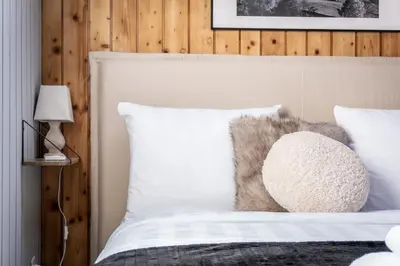 Ein Bett oder Betten in einem Zimmer der Unterkunft Hidden Retreats Grand Lookout Boutique Chalet
