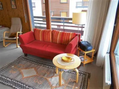 Ein Sitzbereich in der Unterkunft Combyre C 024 -COMFORTABLE apartment 4 pers