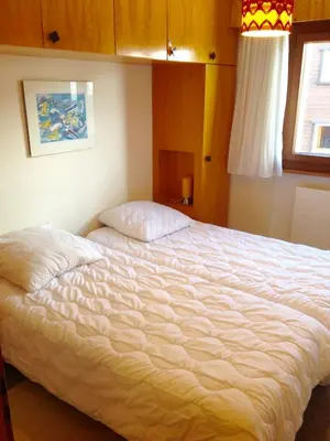 Ein Bett oder Betten in einem Zimmer der Unterkunft Combyre C 024 -COMFORTABLE apartment 4 pers