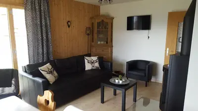 Ein Sitzbereich in der Unterkunft Gentianes G 001 - COSY apartment 6 pers