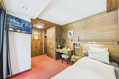 Ein Bett oder Betten in einem Zimmer der Unterkunft Cozy Single Suite in the Heart of Saas-Fee