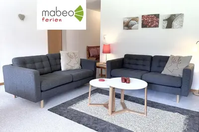 Ein Sitzbereich in der Unterkunft Chalet Woodland - Ferienwohnung mit Terrasse