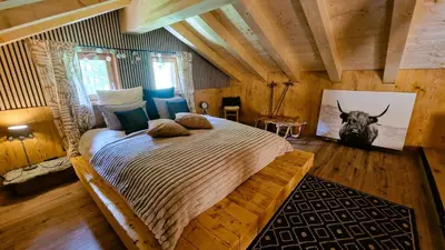 Ein Bett oder Betten in einem Zimmer der Unterkunft Mayen Praz dau Lauc Charme et nature 4 personnes