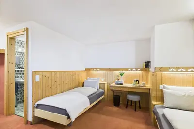 Ein Bett oder Betten in einem Zimmer der Unterkunft Central suite to stay for 2 experience Saas-Fee