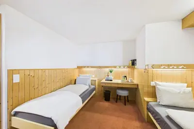 Ein Bett oder Betten in einem Zimmer der Unterkunft Central suite to stay for 2 experience Saas-Fee