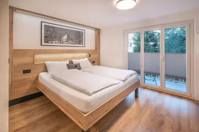 Ein Bett oder Betten in einem Zimmer der Unterkunft Studio Alpenrose - new and modern by Inspiringplaceszermatt