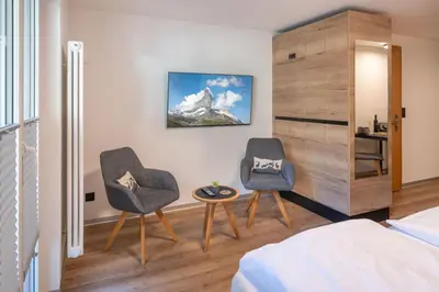 Ein Bett oder Betten in einem Zimmer der Unterkunft Studio Alpenrose - new and modern by Inspiringplaceszermatt