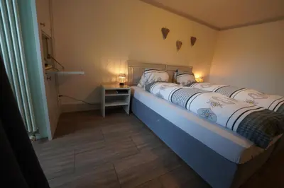 Ein Bett oder Betten in einem Zimmer der Unterkunft Hotel Du Lac - Self Check-in