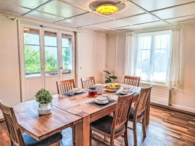 Ein Sitzbereich in der Unterkunft Chalet Haus am See 4B by Interhome