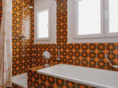 Ein Badezimmer in der Unterkunft Apartment Casa Yolanda 2- OG Süd by Interhome