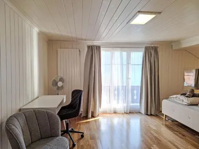 Ein Bett oder Betten in einem Zimmer der Unterkunft Chalet Haus am See by Interhome