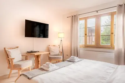 Ein Bett oder Betten in einem Zimmer der Unterkunft Chalet Gemsstock