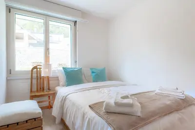 Ein Bett oder Betten in einem Zimmer der Unterkunft AnDerBlick Apartment