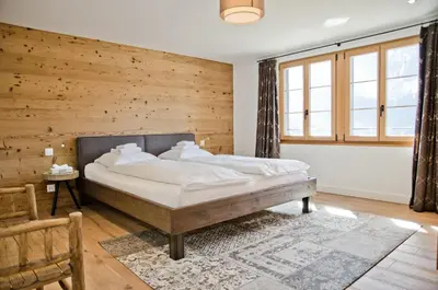 Ein Bett oder Betten in einem Zimmer der Unterkunft Apartment Fortuna 5.5 - GriwaRent AG