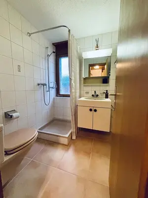 Ein Badezimmer in der Unterkunft Chaletwohnung Thilo