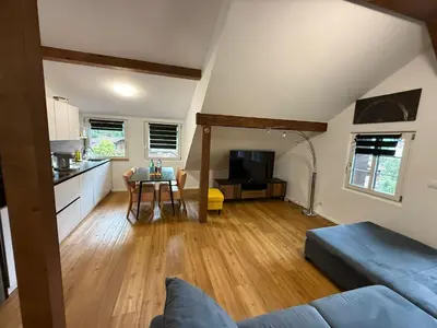 Ein Sitzbereich in der Unterkunft Ferienwohnung Winterzeit near Interlaken Thun Spiez Kandersteg