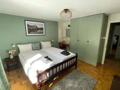 Ein Bett oder Betten in einem Zimmer der Unterkunft Apartment Forest- finest selections by Inspiringplaces Zermatt