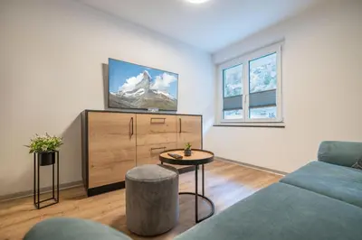 Ein Sitzbereich in der Unterkunft Edelweiss Apartment by Inspiringplaces Zermatt