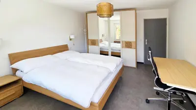 Ein Bett oder Betten in einem Zimmer der Unterkunft Capri Matterhorn View