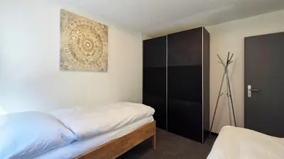Ein Bett oder Betten in einem Zimmer der Unterkunft Capri Matterhorn View