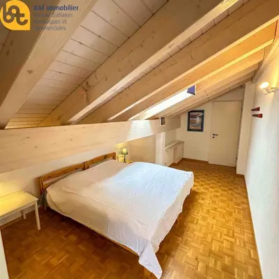 Ein Bett oder Betten in einem Zimmer der Unterkunft Scierie E Moiry 222, attique lumineux proche des télécabines
