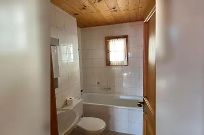 Ein Badezimmer in der Unterkunft Chalet Val Roc - Dachwohnung West