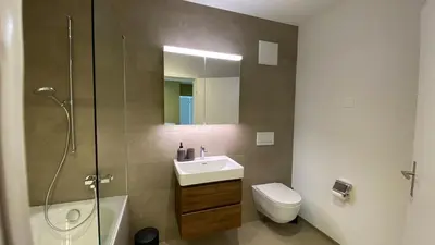 Ein Badezimmer in der Unterkunft FALKE Studio in Spiez