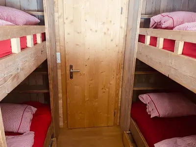 Ein Bett oder Betten in einem Zimmer der Unterkunft Chalet Belland