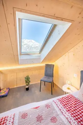 Ein Bett oder Betten in einem Zimmer der Unterkunft Tiny Barrhorn
