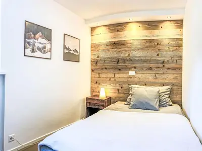 Ein Bett oder Betten in einem Zimmer der Unterkunft Apartment Cristal-12 by Interhome