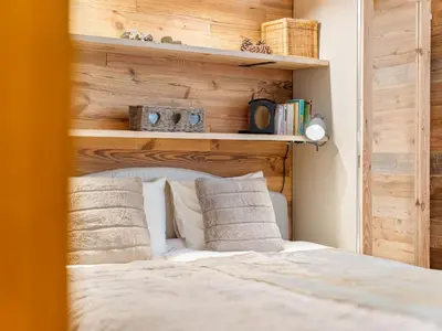 Ein Bett oder Betten in einem Zimmer der Unterkunft Apartment Rochemont B26 by Interhome