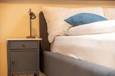 Ein Bett oder Betten in einem Zimmer der Unterkunft B&B Wild und Wandel Meiringen