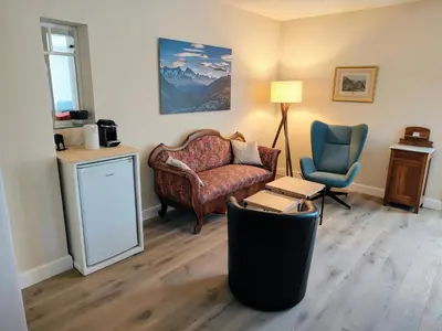 Ein Sitzbereich in der Unterkunft B&B Wild und Wandel Meiringen